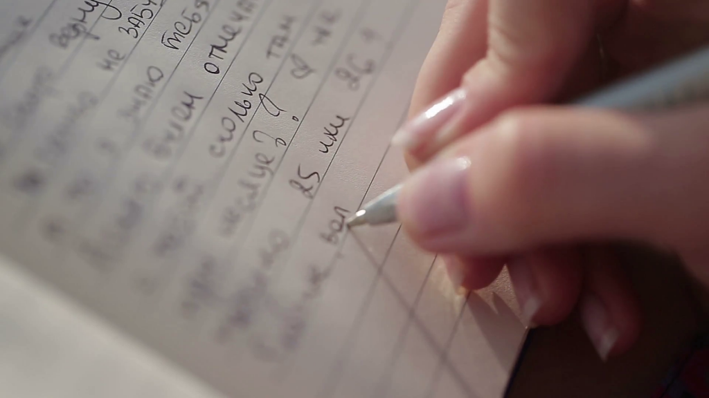 a girl writing a diary
